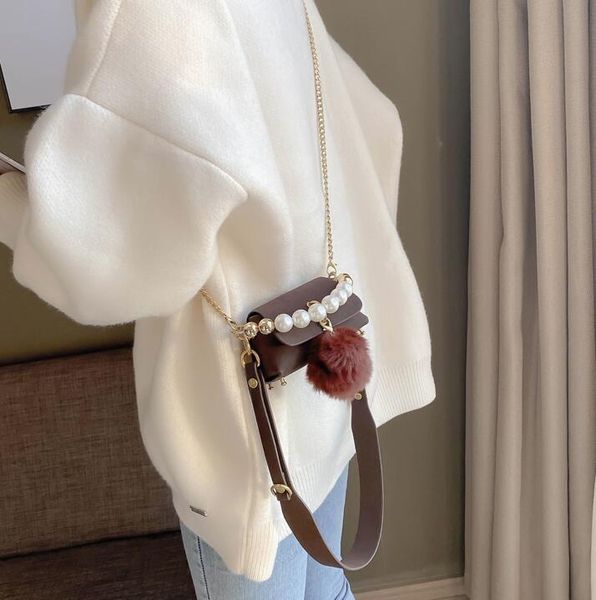 evening bags mini pearl tote bag 2021 fashion high-quality matte pu leather women's designer handbag hairball shoulder messenger
evening bags mini pearl tote bag 2021 fashion high-quality matte pu leather women's designer handbag hairball shoulder messenger