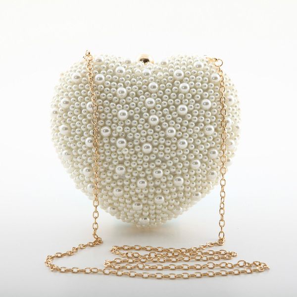 fashion evening bag able heart-shaped pearl hand banquet atmosphere craft embroidered baogong main three-dimensional single
fashion evening bag able heart-shaped pearl hand banquet atmosphere craft embroidered baogong main three-dimensional single