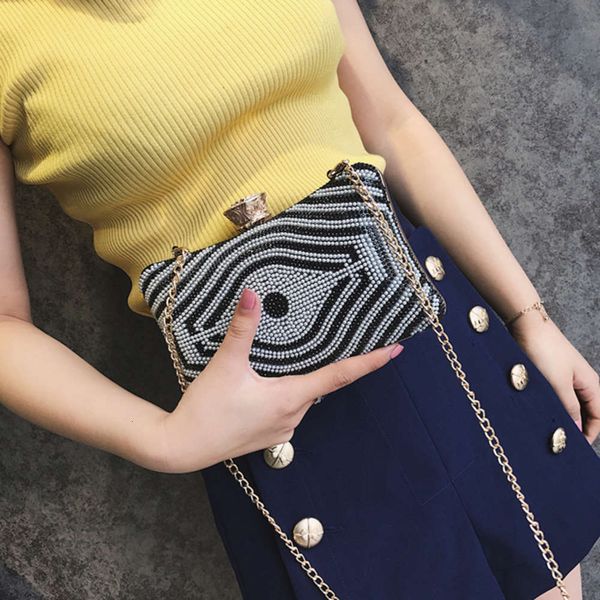 2021 handbag women's leisure diamond inlaid creative eye pearl decorative chain messenger bag
2021 handbag women's leisure diamond inlaid creative eye pearl decorative chain messenger bag