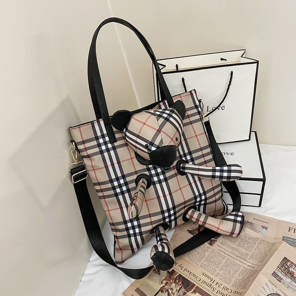 2021 lattice bear oxford spinning leisure capacity tote bag girl student fashion cartoon shoulder bag
2021 lattice bear oxford spinning leisure capacity tote bag girl student fashion cartoon shoulder bag