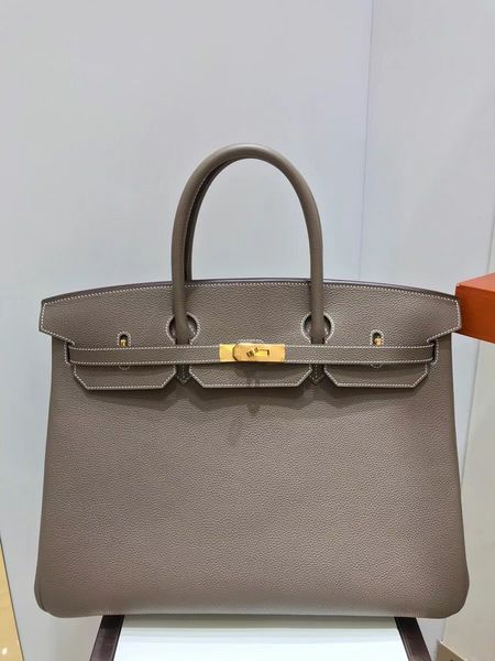 fully handmade 40cm mens handbag luxury handbag togo leather golden or silver hardware etaupe color wax line stitching by order about
fully handmade 40cm mens handbag luxury handbag togo leather golden or silver hardware etaupe color wax line stitching by order about
