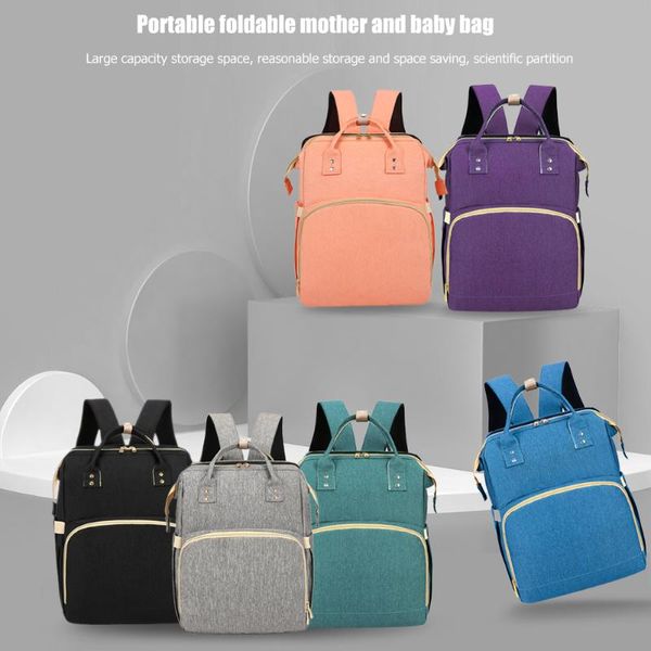multi-function baby diaper backpack oxford cloth stroller nappy maternity bag large capacity travel portable folding bed
multi-function baby diaper backpack oxford cloth stroller nappy maternity bag large capacity travel portable folding bed