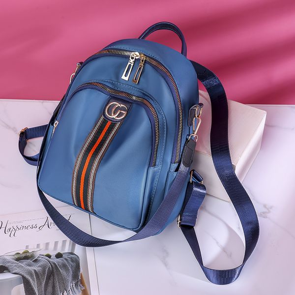 designer oxford cloth women's new multifunctional fashion versatile color strip simple small backpack shopping handbags outlet
designer oxford cloth women's new multifunctional fashion versatile color strip simple small backpack shopping handbags outlet