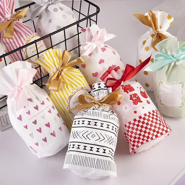 gift wrap 12x17cm plastic creative cookies candy bags with drawstring christmas wedding party gifts packaging bag
gift wrap 12x17cm plastic creative cookies candy bags with drawstring christmas wedding party gifts packaging bag