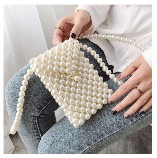 hbp luxurys designers pearl 2019 new beaded single shoulder versatile mini messenger handmade mobile phone bag
hbp luxurys designers pearl 2019 new beaded single shoulder versatile mini messenger handmade mobile phone bag