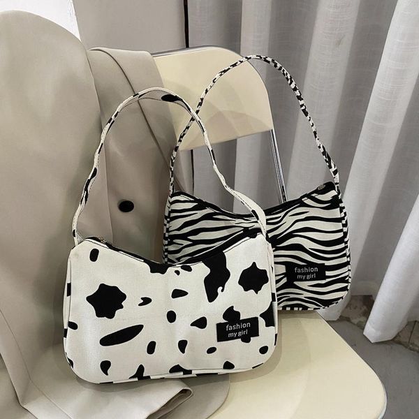 evening bags creative design handbag zebra print cow cute little pendant canvas shoulder bag female fashion accessories wholesale
evening bags creative design handbag zebra print cow cute little pendant canvas shoulder bag female fashion accessories wholesale
