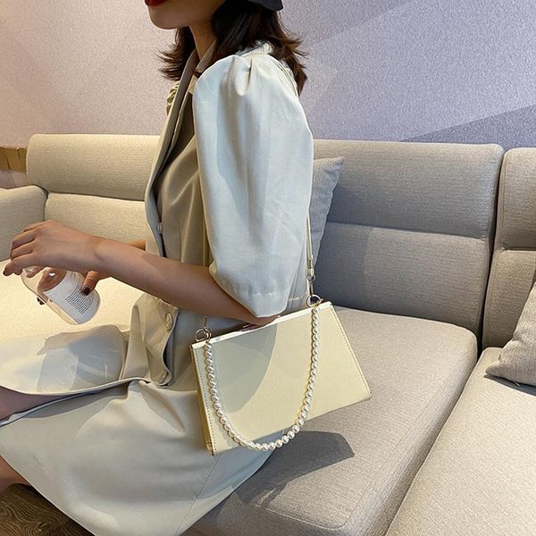evening bags luxury pearl handle handbags and purses fashion flap shoulder for women solid simple crossbody lady small tote
evening bags luxury pearl handle handbags and purses fashion flap shoulder for women solid simple crossbody lady small tote