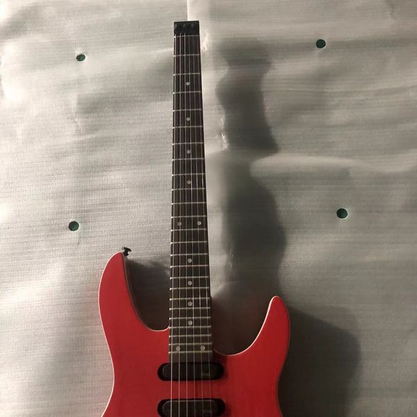 custom headless electric guitar body material basswood ,connect the buckle to the body neck back radian design,color red,can customize
custom headless electric guitar body material basswood ,connect the buckle to the body neck back radian design,color red,can customize