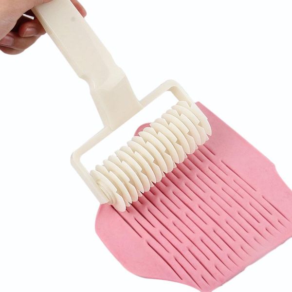 plastic dough lattice roller cutter pull net wheel knife pizza pastry cutter pie craft making tool baking accessories 1pcs 
plastic dough lattice roller cutter pull net wheel knife pizza pastry cutter pie craft making tool baking accessories 1pcs