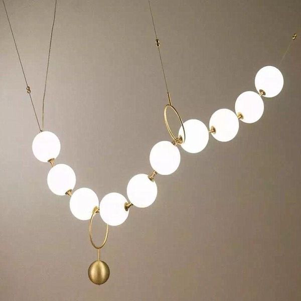 modern white glass ball pendant lamp for restaurant hall creative necklace design decro light fixtures with 8 bulbs
modern white glass ball pendant lamp for restaurant hall creative necklace design decro light fixtures with 8 bulbs