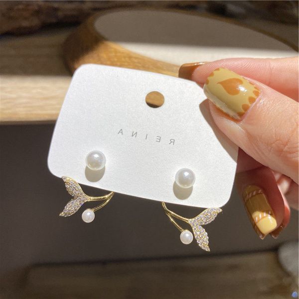 winter micro inlaid fishtail zircon ring korean s925 silver needle temperament east gate personalized earrings, Golden
winter micro inlaid fishtail zircon ring korean s925 silver needle temperament east gate personalized earrings, Golden