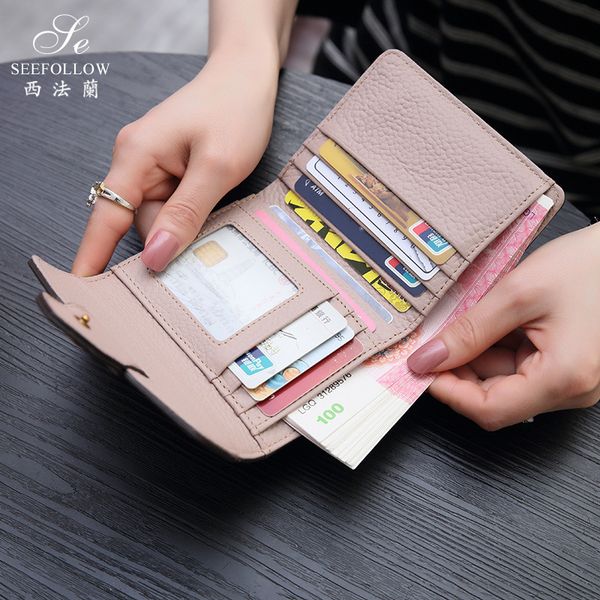 fashion new small wallet women's short leather multi card folding cowhide three fold wallet simple buckle fashion handbags sale, Brown;gray
fashion new small wallet women's short leather multi card folding cowhide three fold wallet simple buckle fashion handbags sale, Brown;gray