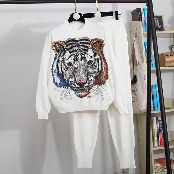 women's two piece pants black and white training set, women's fashions, knitted or crocheted, handmade, with stones, tiger, blouse
women's two piece pants black and white training set, women's fashions, knitted or crocheted, handmade, with stones, tiger, blouse