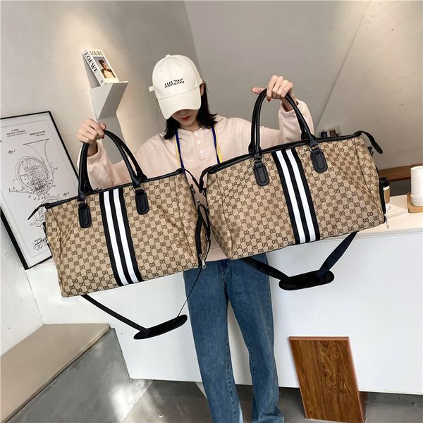 new oxford cloth letter high capacity shoes travel bag women's waterproof black and white strip men's sports fitness bag fashion h
new oxford cloth letter high capacity shoes travel bag women's waterproof black and white strip men's sports fitness bag fashion h
