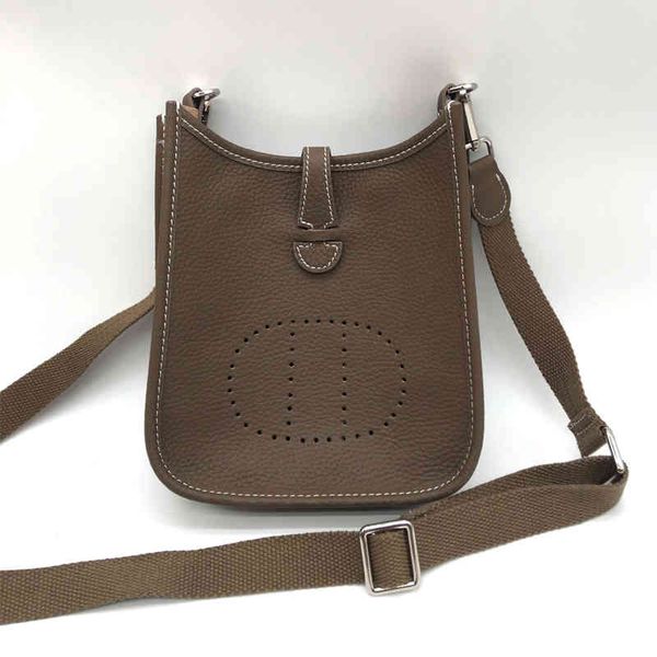 leather messenger bag wide cloth shoulder strap head layer buckle leather evelyn h hollow fashion simple small shoulder bag 18cm
leather messenger bag wide cloth shoulder strap head layer buckle leather evelyn h hollow fashion simple small shoulder bag 18cm