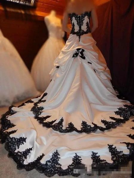 sweetheart gothic lace applique tiered white and black bridal dress long back lace up satin elegant bridal wedding gowns draped
sweetheart gothic lace applique tiered white and black bridal dress long back lace up satin elegant bridal wedding gowns draped
