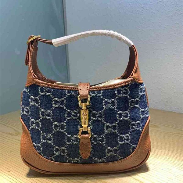 2022 factory wholesale new model jackie mini buckle old flower denim french leather underarm bags
2022 factory wholesale new model jackie mini buckle old flower denim french leather underarm bags