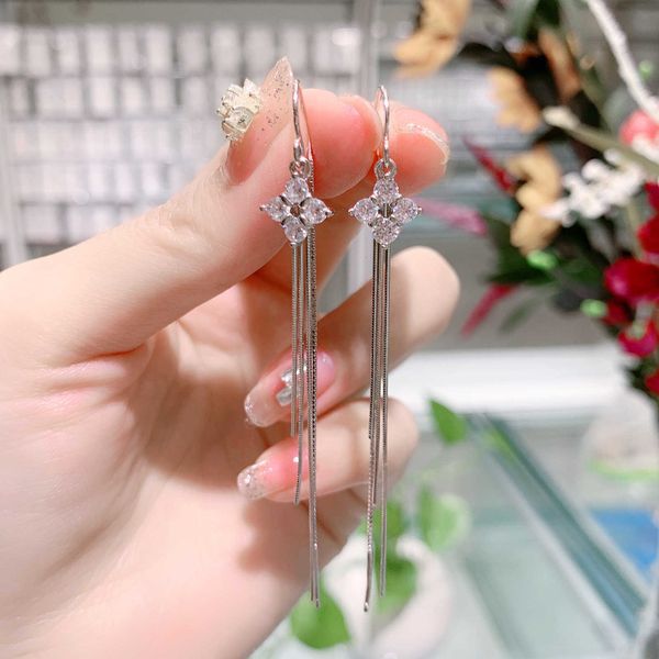 s925 sterling silver four petal flower tassel earrings for women with simple personality temperament
s925 sterling silver four petal flower tassel earrings for women with simple personality temperament