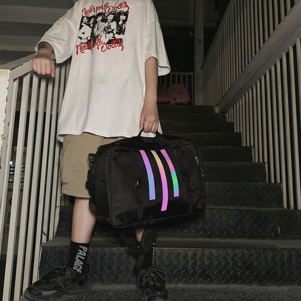 large capacity men backpack nylon sequins cool bagpack school bags for teenager travel back pack 
large capacity men backpack nylon sequins cool bagpack school bags for teenager travel back pack