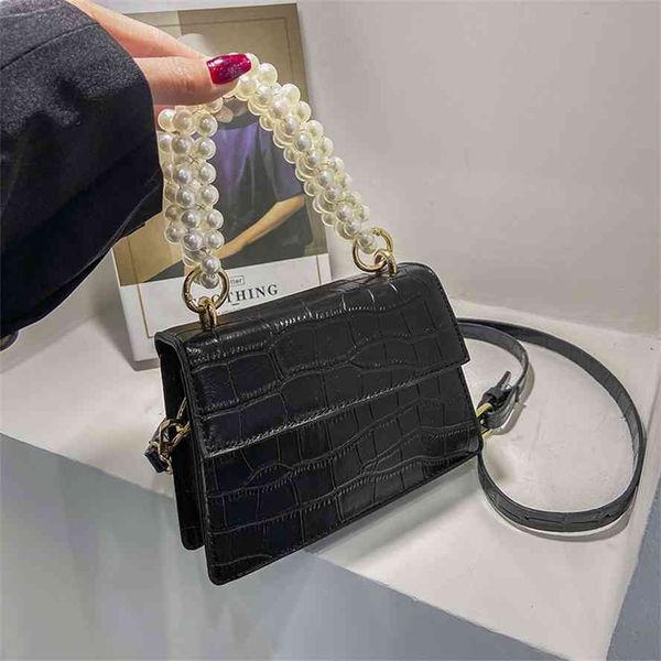 fairy pearl chain girl 2021 spring new fashion slung net red versatile small square bag
fairy pearl chain girl 2021 spring new fashion slung net red versatile small square bag