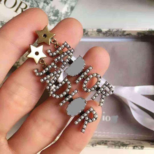 luxury designer fashion jewelry earrings letter 21 dijia d / year family female cd pearl personality, Red;brown
luxury designer fashion jewelry earrings letter 21 dijia d / year family female cd pearl personality, Red;brown