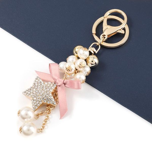keychains fashion metal rhinestone five-pointed star imitation pearl keychain car key ring girl backpack pendant campus accessories, Silver
keychains fashion metal rhinestone five-pointed star imitation pearl keychain car key ring girl backpack pendant campus accessories, Silver