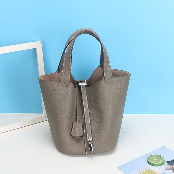 evening bags 2021 female bag silver buckle leather vegetable basket portable bucket large-capacity picture
evening bags 2021 female bag silver buckle leather vegetable basket portable bucket large-capacity picture