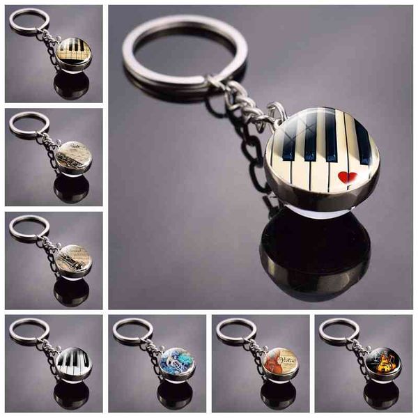 2021 new keychains piano keychain music instruments cleft picture glass ball key chains guitar clarinet te violin pendant keyring, Silver
2021 new keychains piano keychain music instruments cleft picture glass ball key chains guitar clarinet te violin pendant keyring, Silver