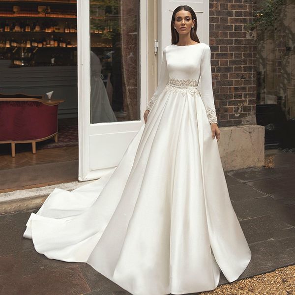 2021 bohemian bride dresses bateau neck applied pearls white satin wedding dress with long sleeves backless robe de mariee
2021 bohemian bride dresses bateau neck applied pearls white satin wedding dress with long sleeves backless robe de mariee