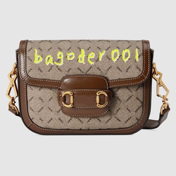 the 1955 mini horsebit petite versions of crossbody bag beige ebony canvas two straps tonal leather/green and red nylon shoulder strap 2 siz
the 1955 mini horsebit petite versions of crossbody bag beige ebony canvas two straps tonal leather/green and red nylon shoulder strap 2 siz