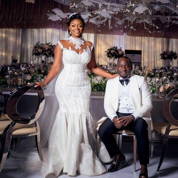 shiny african high neck mermaid wedding dresses appliques lace beads sequins cap sleeve long plus size bridal gowns sheer nude neck vestidos, White
shiny african high neck mermaid wedding dresses appliques lace beads sequins cap sleeve long plus size bridal gowns sheer nude neck vestidos, White