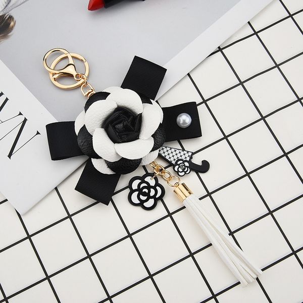 2021 fashion keychain korean pu tassel key ring bowknot skin camellia rose pearl pendant car keyring pendant, Slivery;golden
2021 fashion keychain korean pu tassel key ring bowknot skin camellia rose pearl pendant car keyring pendant, Slivery;golden