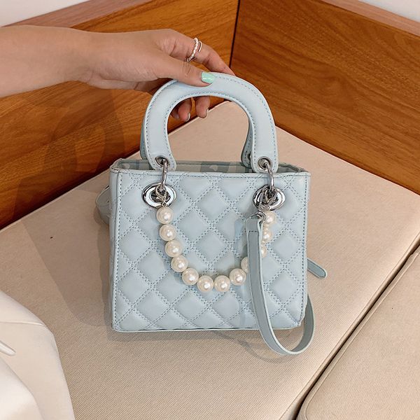 portable bag female 2021 new korean fashion princess diana net red foreign style single shoulder pearl messenger
portable bag female 2021 new korean fashion princess diana net red foreign style single shoulder pearl messenger