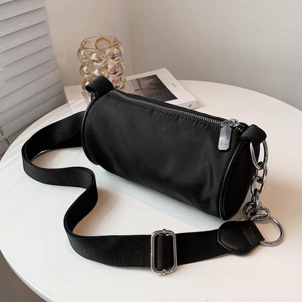evening bags axukes cylindrical shape oxford cloth design 2021 classic messenger bag fashion ladies handbag black wide shoulder strap
evening bags axukes cylindrical shape oxford cloth design 2021 classic messenger bag fashion ladies handbag black wide shoulder strap