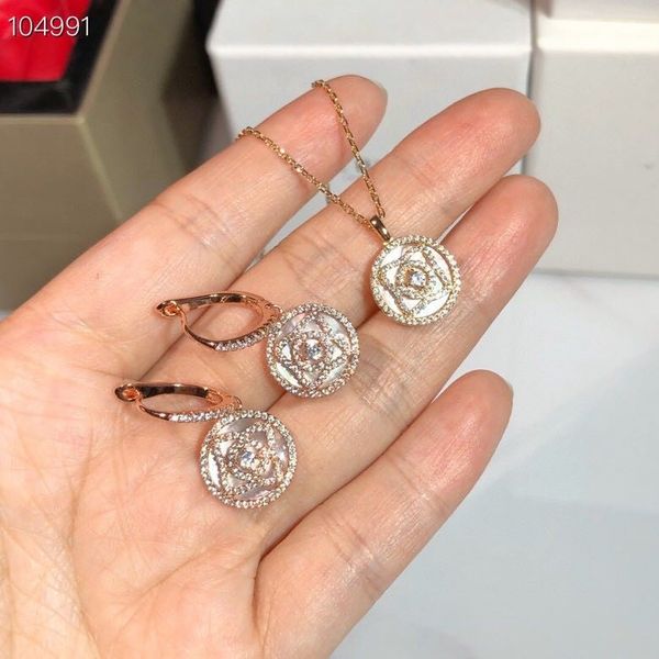 luxury echanted lotus brand s925 sterling silver white ceramic round coin pendant necklace and earrings jewelry set for women
luxury echanted lotus brand s925 sterling silver white ceramic round coin pendant necklace and earrings jewelry set for women