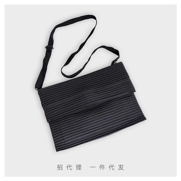 in stock miyake pleated canvas casual solid color folding bag messenger bag selling
in stock miyake pleated canvas casual solid color folding bag messenger bag selling