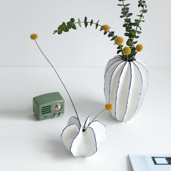nordic minimalist ceramics star fruit vase ornaments dried flowers living room home decoration semi-manual flower vases
nordic minimalist ceramics star fruit vase ornaments dried flowers living room home decoration semi-manual flower vases