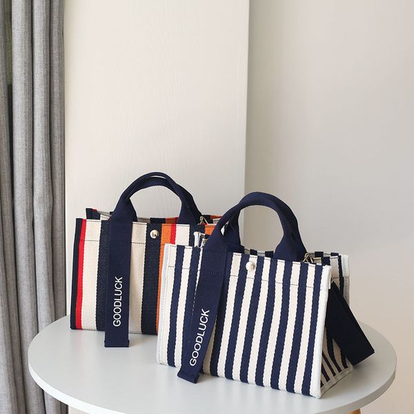 luxury herme handbags and storage minority design trend stripe messenger canvas waterproof fashion work shoulder paul he 
luxury herme handbags and storage minority design trend stripe messenger canvas waterproof fashion work shoulder paul he
