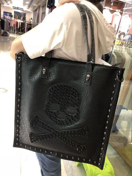 duffel bags european and american leisure men women single shoulder bag personality rivet hand-held messenger leather
duffel bags european and american leisure men women single shoulder bag personality rivet hand-held messenger leather