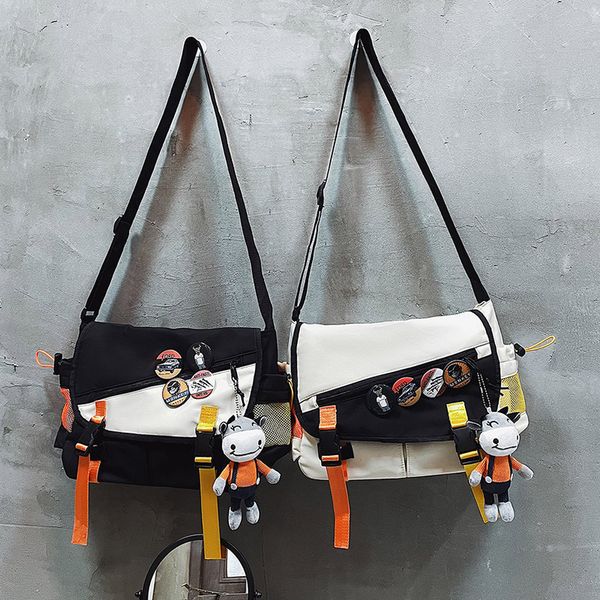 street men's fashion brand couple tooling student postman bag women's leisure one shoulder messenger tote bag
street men's fashion brand couple tooling student postman bag women's leisure one shoulder messenger tote bag