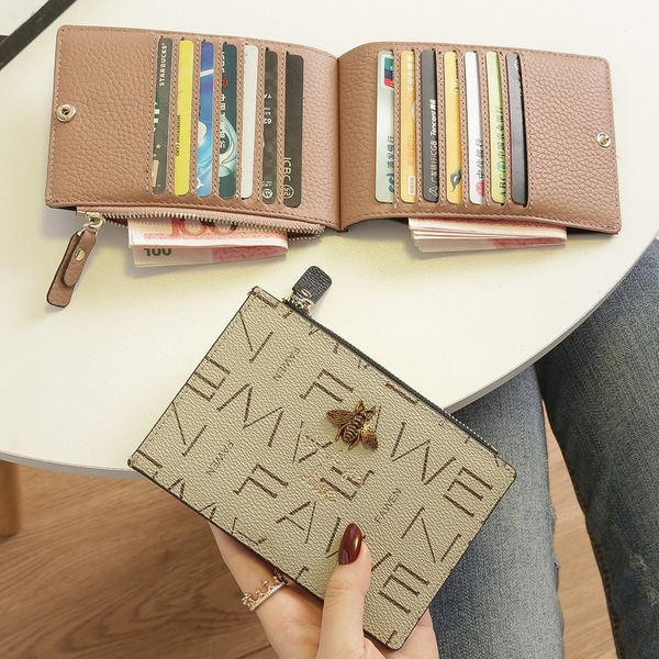 2021 small purse short leather lady cowhide multi-card card bag big super-thin card bag business card holder, Red;black
2021 small purse short leather lady cowhide multi-card card bag big super-thin card bag business card holder, Red;black