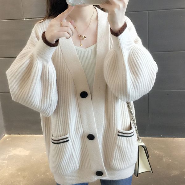 2021 new solid autumn spring ladies kintted lantern sleeve woman sweater with buttons and pockets casual female cardigans yad6, White;black
2021 new solid autumn spring ladies kintted lantern sleeve woman sweater with buttons and pockets casual female cardigans yad6, White;black