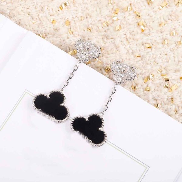 s925 silver luxurious quality two flowers shape with diamond and black agate drop earring in platinum for women wedding jewelry in
s925 silver luxurious quality two flowers shape with diamond and black agate drop earring in platinum for women wedding jewelry in