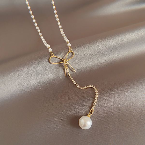 xianlan685 french pearl tassel pendant bow necklace female temperament in the summer of luxury niche collar bone dust necklace cha, Silver
xianlan685 french pearl tassel pendant bow necklace female temperament in the summer of luxury niche collar bone dust necklace cha, Silver