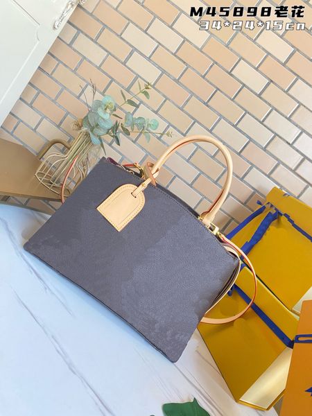 2022 classic selling leather designer onthego gm bag tote twist pattern portable bag shopping handbag one-shoulder pocket cosmetic m45898
2022 classic selling leather designer onthego gm bag tote twist pattern portable bag shopping handbag one-shoulder pocket cosmetic m45898
