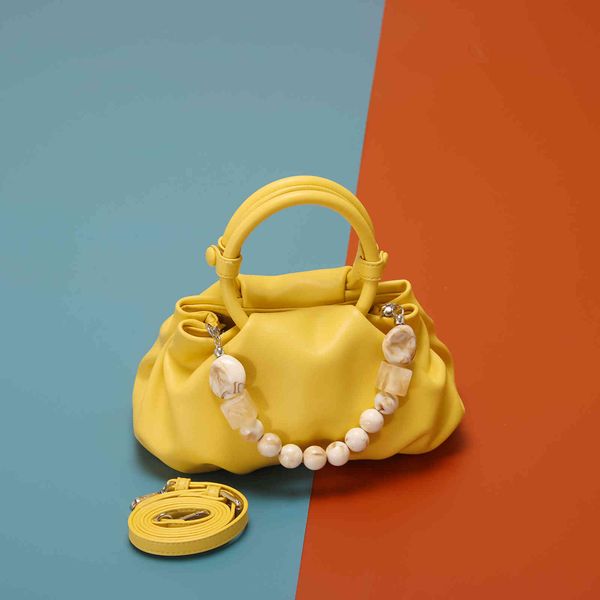 2021 summer pearl soft leather cloud women's bag french minority fold diagonal cross dumpling one shoulder hand, Black;red
2021 summer pearl soft leather cloud women's bag french minority fold diagonal cross dumpling one shoulder hand, Black;red