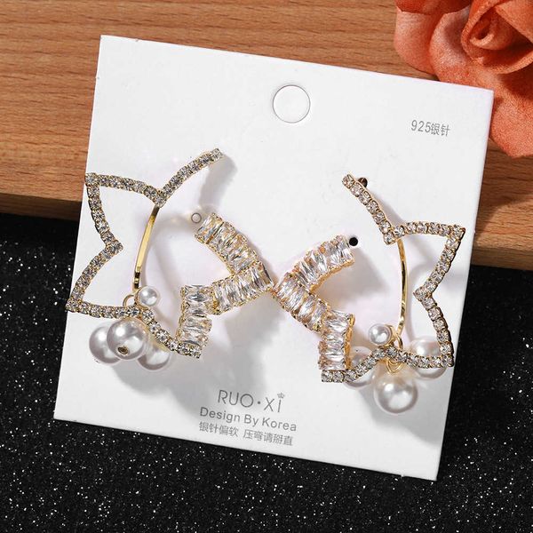 new fashion exquisite temperament japanese and korean net red party diamond five point pearl silver needle ear
new fashion exquisite temperament japanese and korean net red party diamond five point pearl silver needle ear