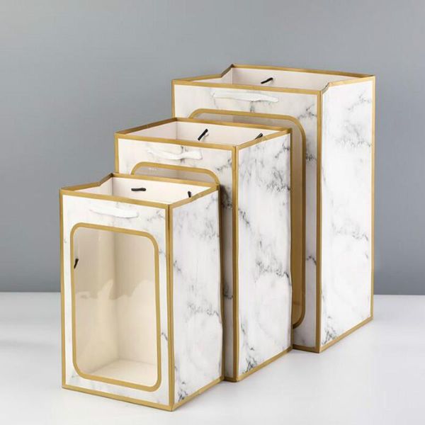 12pcs/lot kraft paper bag with pvc windows marbling gift packing bags for store clothes christmas party supplies 21030401
12pcs/lot kraft paper bag with pvc windows marbling gift packing bags for store clothes christmas party supplies 21030401