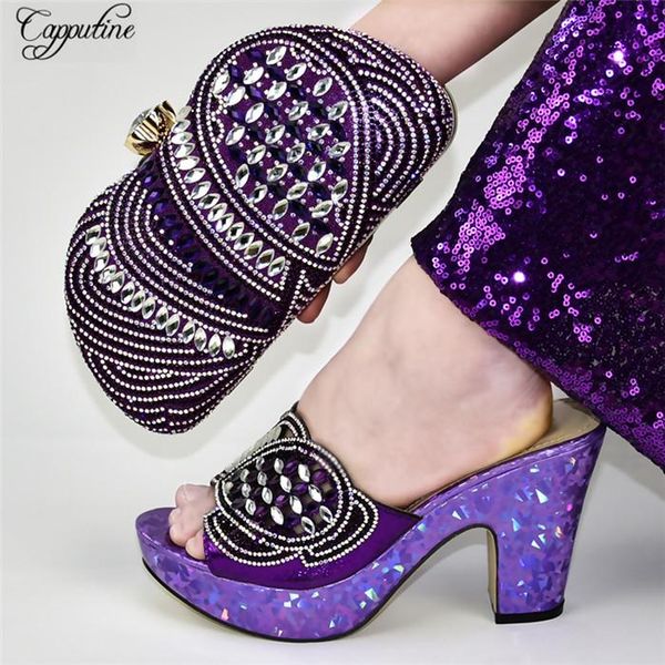 dress shoes wonderful purple african sandal and evening handbag set with rhinestones 688-15, heel height .5cm, Black
dress shoes wonderful purple african sandal and evening handbag set with rhinestones 688-15, heel height .5cm, Black