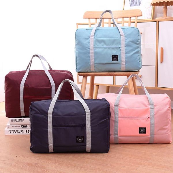 storage bags 2021 nylon foldable travel large capacity bag luggage women waterproof handbags men clothing organizer
storage bags 2021 nylon foldable travel large capacity bag luggage women waterproof handbags men clothing organizer